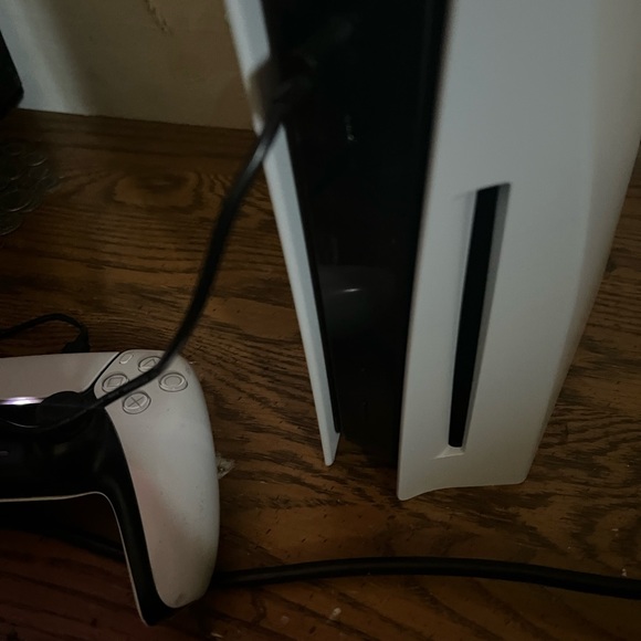 basically new
comes with :
multiple games downloaded
1 controller 
All cords